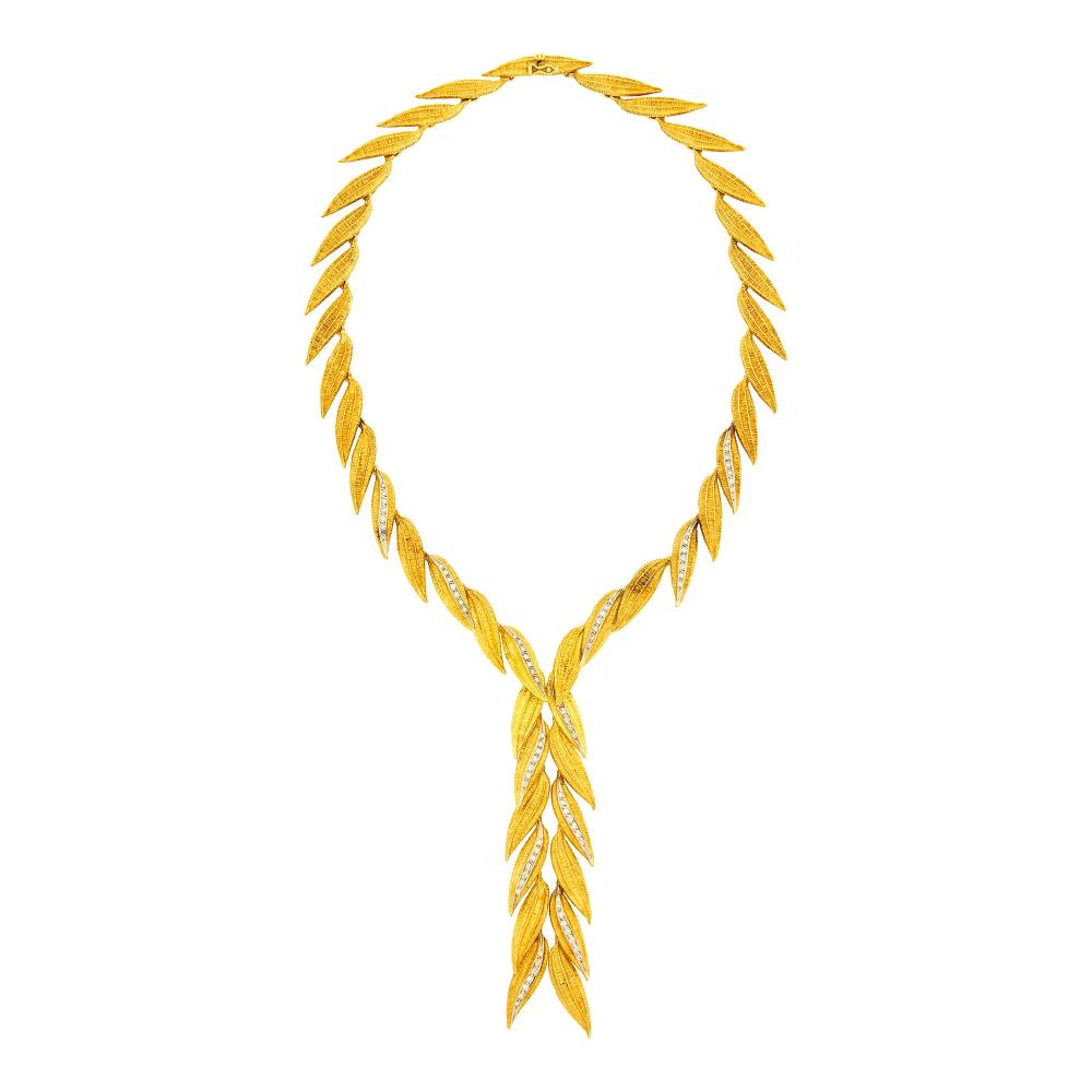 Property of a Distinguished Lady from Athens, Greece18 kt. yellow and white gold, 84 round diamonds ap. 2.50 cts., signed Mapamenos Natepas, Greece, with maker’s mark, ap. 115.8 dwts. Length 21 1/2 inches.

Tests for 18 kt.Diamonds: I-J-K-VS-SI.Leaf width 3/8 inch. Pendant length 5 5/8 inches.                            
Any condition statement is given as a courtesy to a client, is an opinion and should not be treated as a statement of fact and our Organization shall have no responsibility for any error or omission. Please contact the specialist department to request further information or additional images that may be available.