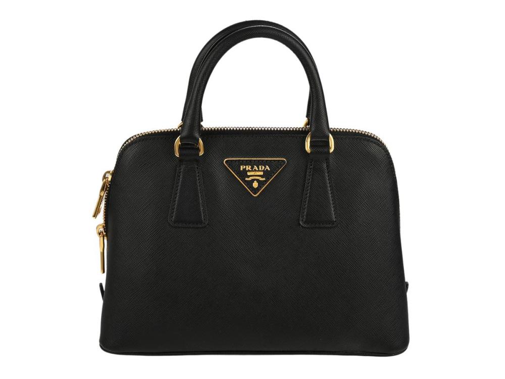 Accessories

Handbags

BAG, PRADA, Bauletto Bag, black saffiano leather, gold-tone hardware, 25x18x10,5 cm, black shoulder strap, receipt from 2015, dustbag, box.