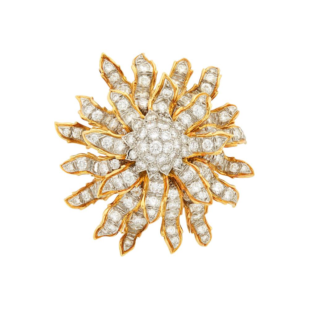 Property of a Distinguished Lady from Athens, Greece18 kt., 130 round diamonds ap. 10.00 cts., signed Tiffany & Co., ap. 25 dwts.

Diamonds: G-H-I-VS.1 3/16 x 1 1/16 inches.                            
Any condition statement is given as a courtesy to a client, is an opinion and should not be treated as a statement of fact and our Organization shall have no responsibility for any error or omission. Please contact the specialist department to request further information or additional images that may be available.