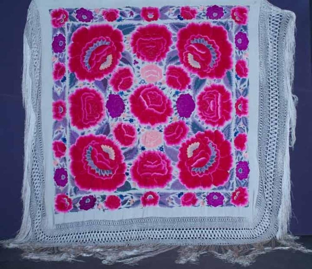 OVERSIZE EXPORT SHAWL, CHINA, 1890-1910

White silk ground, silk embroidered large, extra large & huge peonies in shades of red, purple, pink & peac, hand knotted perimeter fringe, 65" x 64", Fringe 29", (1 brown quarter size stain in 1 corn