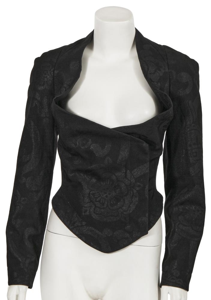 A Vivienne Westwood printed black wool-blend blazer, ’Five Centuries Ago’ collection, Autumn-Winter 1997-98

A Vivienne Westwood printed black wool-blend blazer, ’Five Centuries Ago’ collection, Autumn-Winter 1997-98

Couture label, size 12, printed with black metallic Tudor rose motif, with wrapover front closure, concealed gilt orb buttons, draped neckline, fitted waist, pointed front hem, bust approx 91cm 36in, waist 76cm 30in

Share this lot: