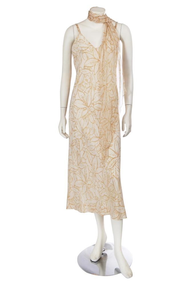 A Halston printed beige crêpe de chine dress, circa 1978

A Halston printed beige crêpe de chine dress, circa 1978

labelled, printed all over with floral designs, with matching chiffon stole, bust 91cm 36in (2)

Share this lot:
