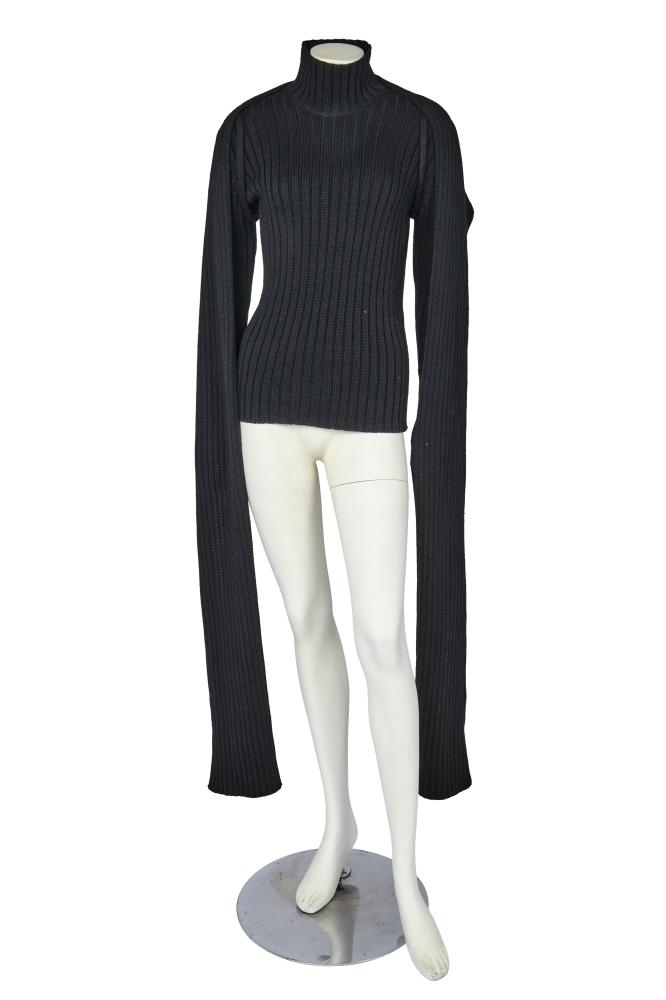 A Helmut Lang ribbed black wool sweater and stole, probably 2000s

A Helmut Lang ribbed black wool sweater and stole, probably 2000s

black on black woven labels, comprising a mock neck sweater, bust 91-112cm 36-44in; a matching stole with integral arm loops, length approx 279cm 110in (2)

Share this lot: