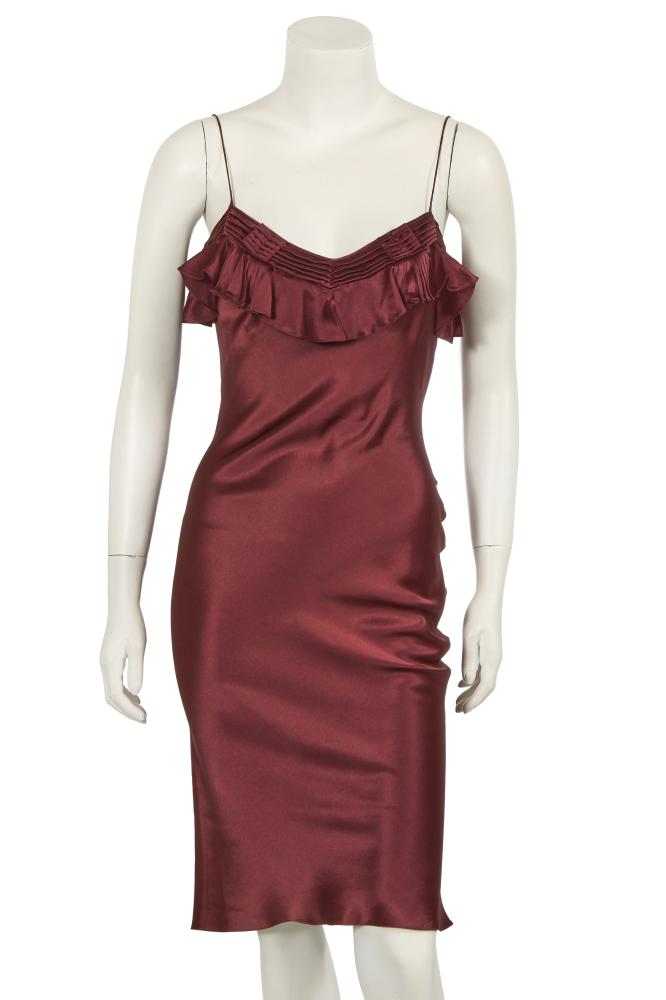 A John Galliano wine satin slip dress, 2004

A John Galliano wine satin slip dress, 2004

rubber label, size GB 8, of bias-cut, the bodice edged in pleats and ruffles, with spaghetti straps, bust approx 81cm 32in

Share this lot: