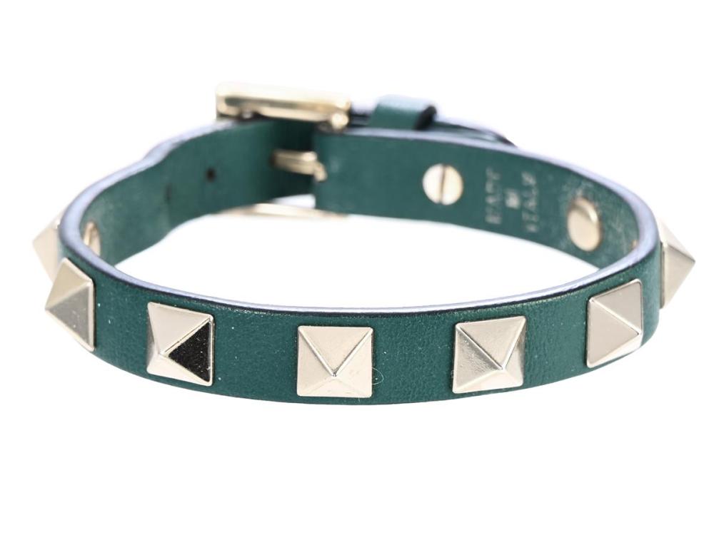 Accessories

Miscellaneous

BRACELET, VALENTINO, Rockstud Bracelet, green leather, gold-tone metal studs, length 17-20 cm, width 1 cm, jewellery pouch.