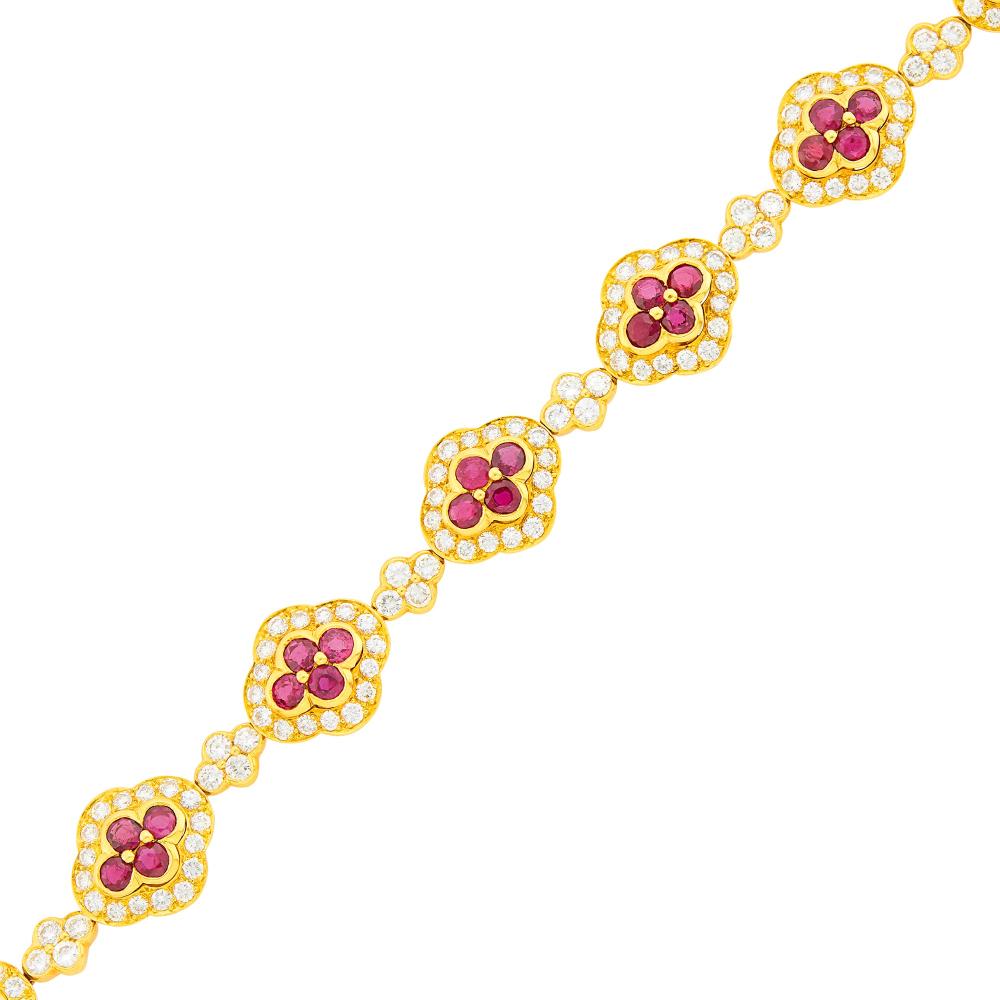 The Martin and Lynn Halbfinger Collection18 kt., 32 round rubies ap. 3.20 cts., 160 round diamonds approximately 4.60 cts., signed Cartier, partially numbered, ap. 14.5 dwts. Length 6 3/8 inches.

Rubies: deep slightly purplish red, slightly so some moderately included, lively.Diamonds: F-G-H-VS.Width 1/2 inch.                            
Any condition statement is given as a courtesy to a client, is an opinion and should not be treated as a statement of fact and our Organization shall have no responsibility for any error or omission. Please contact the specialist department to request further information or additional images that may be available.