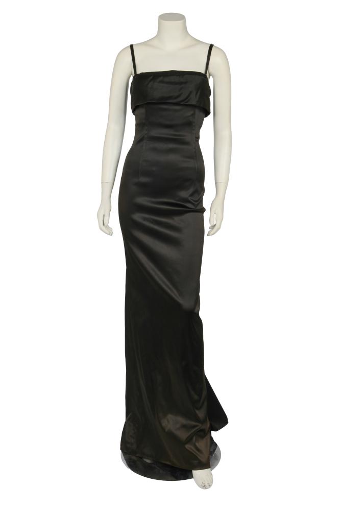 A Dolce & Gabbana black satin sheath dress, 2000s

A Dolce & Gabbana black satin sheath dress, 2000s

labelled, size 40, with fold-over neckline, interior boned mesh bodice, integral black satin bra, gored hem, bust 76cm 30in

Share this lot: