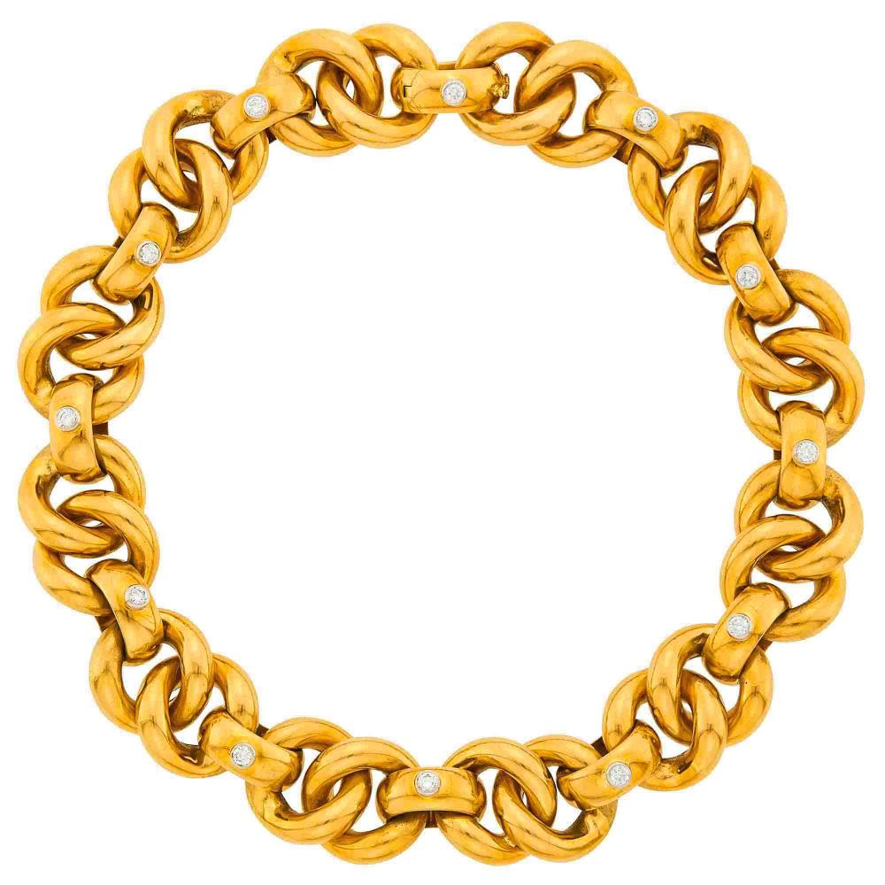 18 kt., 12 round diamonds ap. 1.70 cts., signed Tiffany & Co, Paloma Picasso, Italy, with Italian assay mark, ap. 103.3 dwts. Length 16 inches.

Diamonds: G-H-VSMinor discoloraton spot on reverse of one bar link.Width 7/8 inch.                            
Any condition statement is given as a courtesy to a client, is an opinion and should not be treated as a statement of fact and our Organization shall have no responsibility for any error or omission. Please contact the specialist department to request further information or additional images that may be available.
