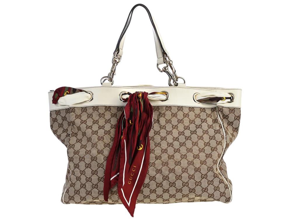 Accessories

Handbags

BAG, GUCCI, Large Positano Tote Bag, beige fabric GG, ivory leather, gold-tone hardware, 41x29x13 cm, dustbag.
