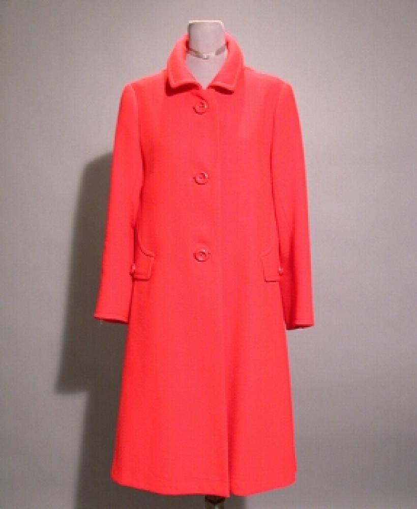 Balmain Orange Double Knit Coat Garbure

Lot 535
Balmain Orange Double Knit Coat Garbure
 French, 1969 
 Double knit, with curved seaming at side pockets, side pleats, large orange buttons, size 8, labeled: Pierre Balmain/Paris, tape label no: 146569.
 With copy of bill of sale.