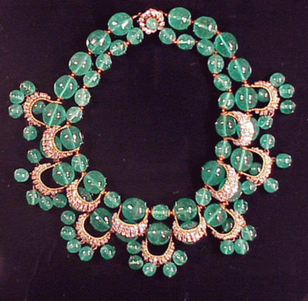 Miriam Haskell Green Bead Necklace

Lot 234
Miriam Haskell Green Bead Necklace
 Two strands, with rhinestone half loops hung with bead pendants, marked.