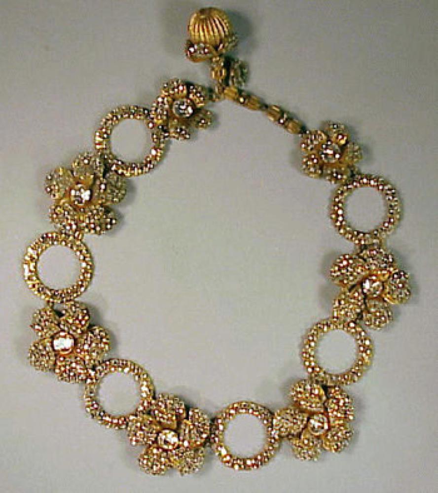 Miriam Haskell Rhinestone Necklace

Lot 223
Miriam Haskell Rhinestone Necklace
 Alternating rings and flowerheads, marked.
 See Cera, The Jewels of Miriam Haskell, p.128.
