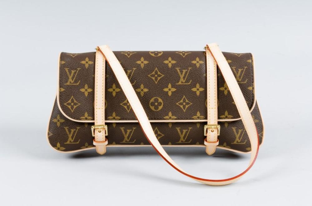 Louis VUITTON

Sac à main modèle "Marelle" en toile monogram et cuir naturel, fermetures ceinture sur rabat, anse, intérieur à deux soufflets. Très bon état