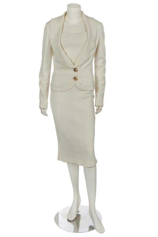 A John Galliano textured weave ivory summer ensemble, pre-collection 2000

A John Galliano textured weave ivory summer ensemble, pre-collection 2000

labelled and size M, of stretchy viscose, comprising: a camisole top with tufted upper edge; a matching figure-hugging skirt with faux pocket flaps; and a cardigan-like jacket with faux horn buttons with Galliano monogram, bust approx 86-92cm, 34-36in, waist 66cm 26in (3)

Share this lot: