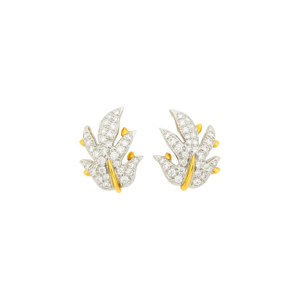 Private Palm Beach Collection18 kt., 62 round diamonds ap. 1.85 cts., signed Tiffany & Co., Schlumberger Studios, ap. 8.4 dwts.

Diamonds: G-H-I-VS.Clip-backs. 7/8 x 11/16 inch.                            
Any condition statement is given as a courtesy to a client, is an opinion and should not be treated as a statement of fact and our Organization shall have no responsibility for any error or omission. Please contact the specialist department to request further information or additional images that may be available.
