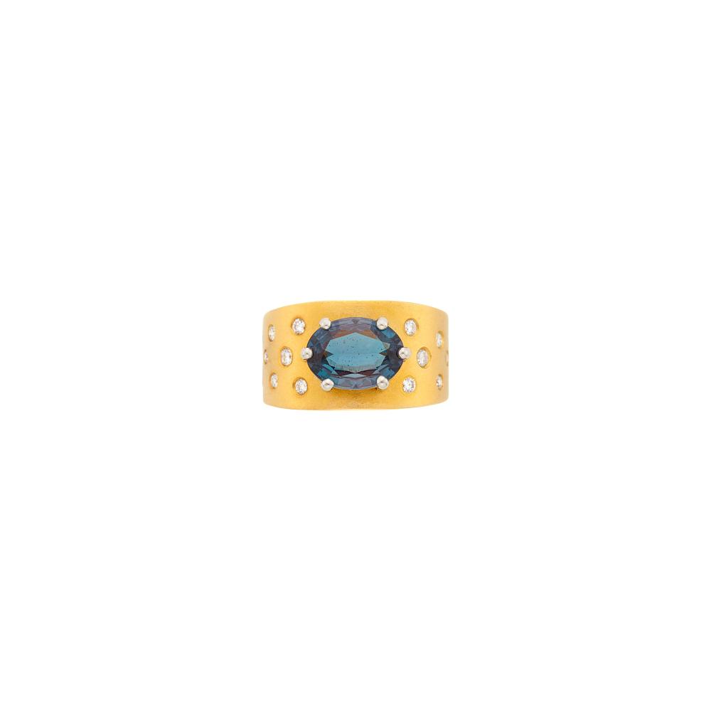 14 kt. yellow and white gold, one oval alexandrite weighing 2.33 cts., 20 round diamonds ap. .40 ct., ap. 6 dwts. Size 8.
With AGL report no. 1153897 stating Brazil origin, with no gemological evidence of enhancement. Color Description: Blue-Green to Purple-Pink. Degree of Color-Change: Prominent (90-100%). 
Quality of Color-Change: Excellent.

Alexandrite: medium deep blue-green to purple-pink, cleanish, shallow crown angles, good transparency, lively.Ring width 1/2 to 1/4 inch.                            
Any condition statement is given as a courtesy to a client, is an opinion and should not be treated as a statement of fact and our Organization shall have no responsibility for any error or omission. Please contact the specialist department to request further information or additional images that may be available.