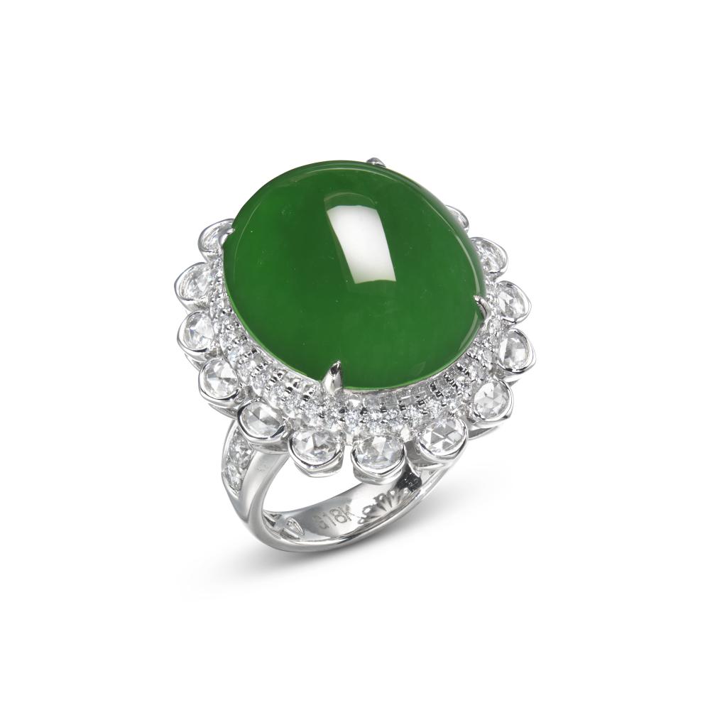 JADEITE AND DIAMOND RING

Oval-shaped jadeite (Fei Cui) cabochon measuring approximately 20.1 x 17.2 x 6.3 mm (back covered), rose-cut and round diamonds, gold 
HK Jade & Stone Lab, 2026, report no. KJ 108936: origin inconclusive, Fei Cui (Jadeite Jade), without resin 
Size/Dimensions: US ring size 6 ¹⁄₄ 
Gross weight: 14.5 grams