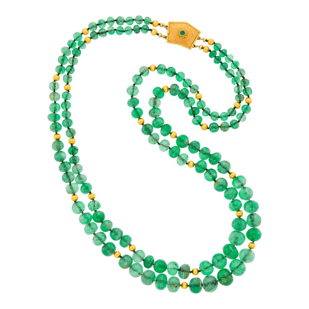 Property from a Prominent Maryland Collection18 kt. rose and yellow gold, vari-shaped emerald beads ap. 10.7 to 4.8 mm., finely ribbed beads, pentagon-shaped clasp, one small round emerald, signed Buccellati, Italy. Length 21 1/4 inches.

Emerald beads: medium light to medium green, included, surface-reaching inclusions, out-of-round to barrel and donut-shaped, translucent, good polish.                            
Any condition statement is given as a courtesy to a client, is an opinion and should not be treated as a statement of fact and our Organization shall have no responsibility for any error or omission. Please contact the specialist department to request further information or additional images that may be available.