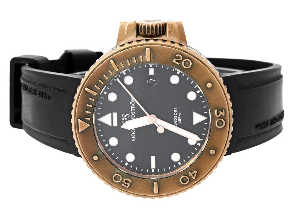 Watches

Sjöö Sandström

SJÖÖ SANDSTRÖM, Landsort (459m), Cal SS G15, Serial no. 49, Ref no. Bronze-2442-D5, men´s wristwatch, 42,5 mm, bronze, self winding, sapphire crystal, date, integrated rubber strap, original bronze buckle, approx. 2020, box (not complete).