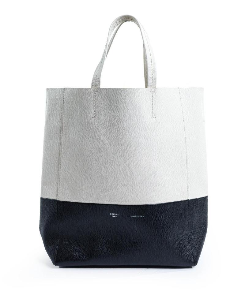 Description
Celine. 

Cabas Tote, 2015, of black and white grained calfskin leather, further detailed with a non-detachable shoulder strap, comes with the bag only 

Width x Height x Depth: 29 x 24 x 10 cm