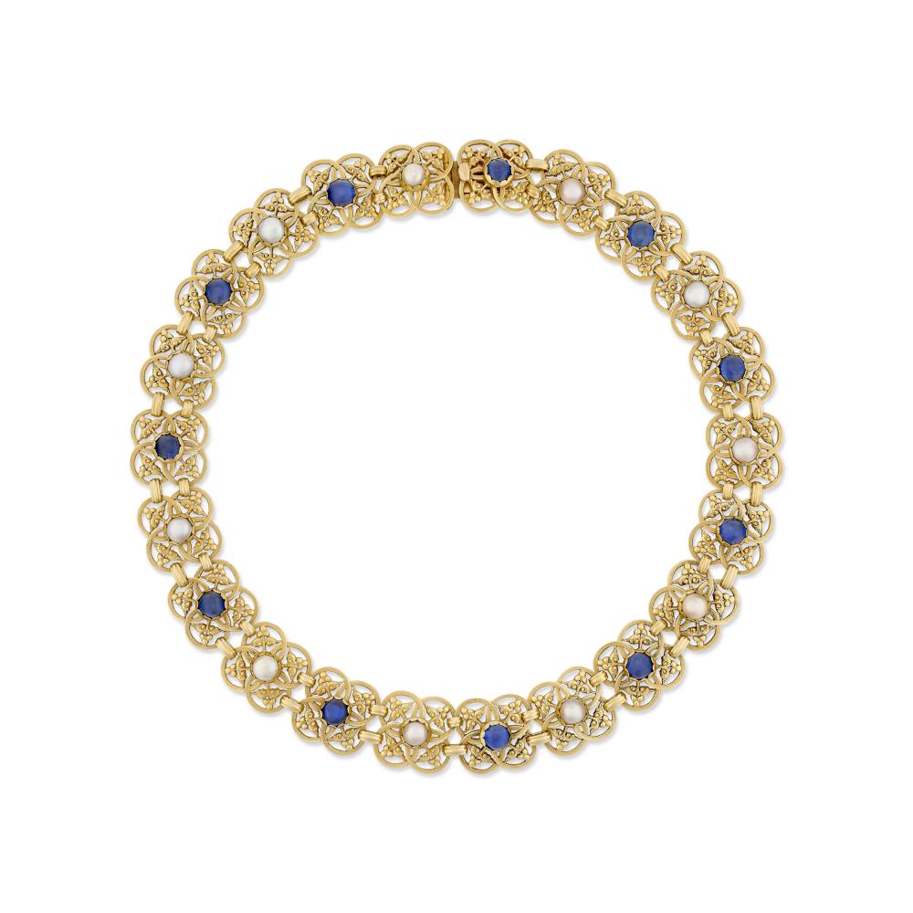 JULES WIÈSE ANTIQUE SAPPHIRE AND PEARL NECKLACE

Sapphire cabochons, button-shaped pearls, 18k yellow gold (French marks), 1890s, signed Wiese, maker’s mark 
Size/Dimensions: 39.0 cm long 
Gross weight: 92.5 grams 
 Please note that the pearls have not been tested for natural origin.