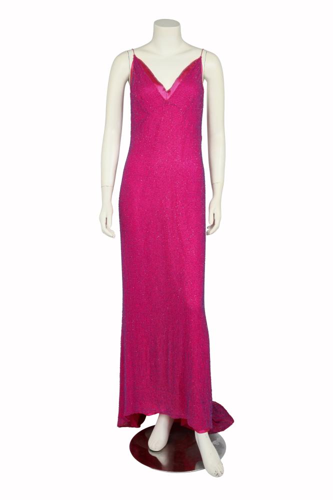 A Jenny Packham beaded magenta gown owned by Lesley Garrett, 2000s

A Jenny Packham beaded magenta gown owned by Lesley Garrett, 2000s

labelled, size 12, the magenta silk ground embellished with small blue beads, the neckline trimmed with pink satin, with trained hem, back zip closure, bust 91cm 36in; together with a signed letter of authenticity (2)

Lesley Garrett CBE is a celebrated English soprano, broadcaster, and media personality. Often called Britain’s most popular soprano for bringing opera to a wider audience, she became a principal soprano at English National Opera, has appeared in shows like Strictly Come Dancing and Who Do You Think You Are, and has released numerous successful albums, including Soprano in Red.

Proceeds from this sale are being donated to WayfinderWoman Trust.

Share this lot: