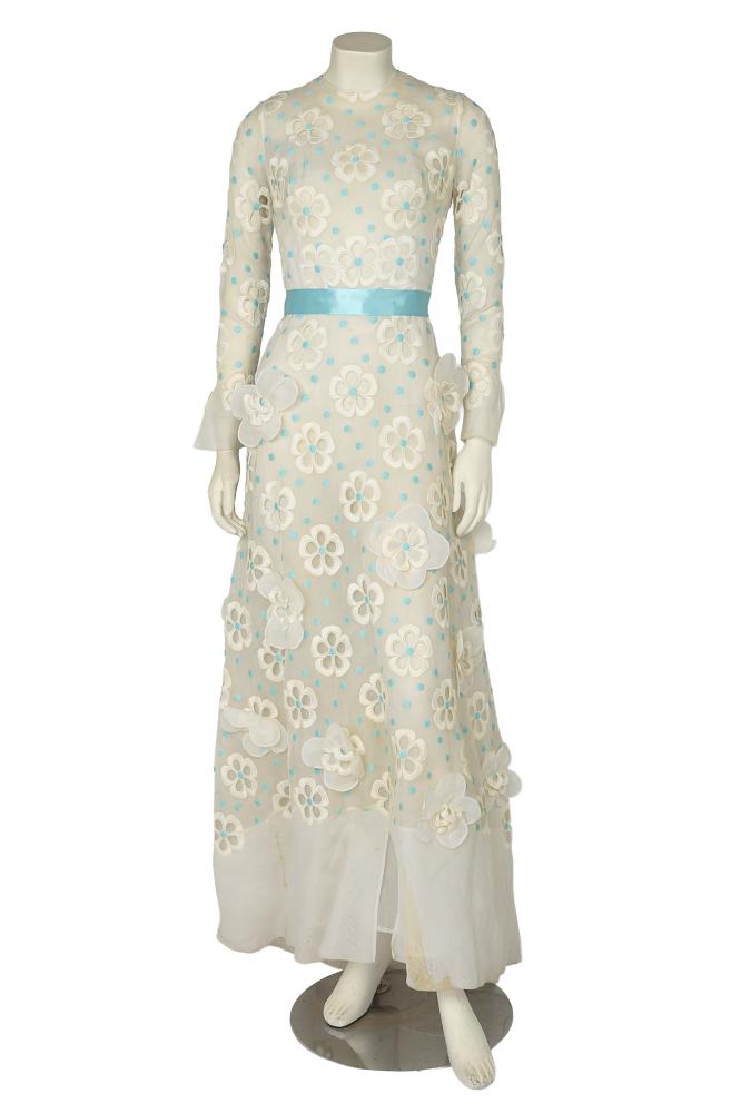 A Carven haute couture embroidered white organza maxi dress, circa 1969

A Carven haute couture embroidered white organza maxi dress, circa 1969

unlabelled, with turquoise polka dots, cutwork daisies, the lower skirt with appliquéd layered daisy motifs, turquoise satin ribbon belt, bust approx 86cm 34in, waist 66cm 26in

Share this lot: