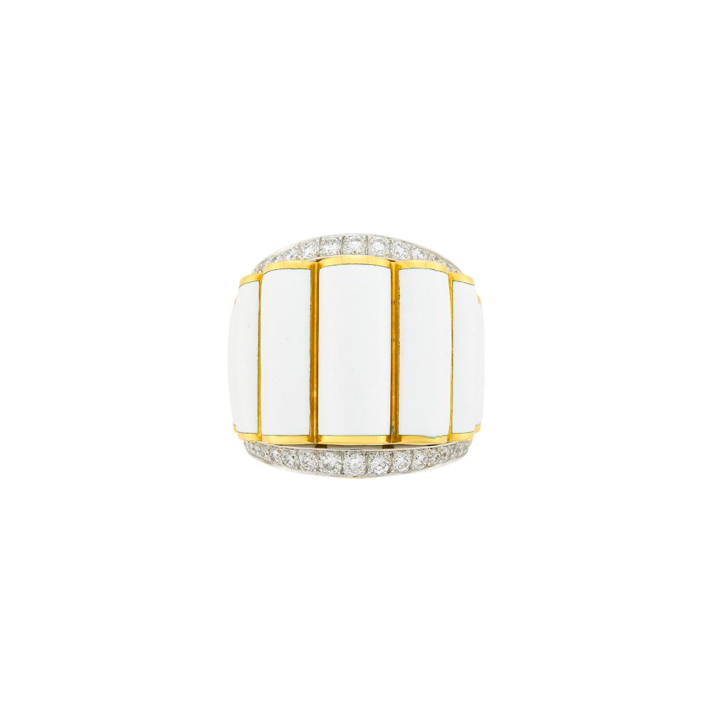 Property from the Collection of Augusta Patton18 kt., 52 round diamonds ap. 1.00 ct., signed David Webb, no. C8307, ap. 21.2 dwts. Size 6 1/4.

Diamonds: G-H-VS.Enamel in good condition.Width of center 1 inch, tapers to gold shank of 5/16 inch.                            
Any condition statement is given as a courtesy to a client, is an opinion and should not be treated as a statement of fact and our Organization shall have no responsibility for any error or omission. Please contact the specialist department to request further information or additional images that may be available.