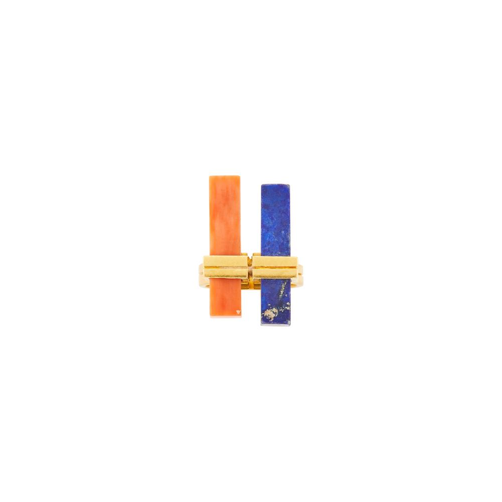 Property of a Distinguished Lady from Athens, Greece18 kt., one coral and one lapis rectangular cuboids ap. ap. 22.0 x 5.0 x 5.0 mm., signed Chaumet Paris France, with maker’s mark and French assay mark, ap. 6 dwts. gross. Size 3 1/4.

Coral: medium pinkish orange, minor mottling, chip at edge, minor surface-reaching inclusion, at one tip small piece of rock, good luster.Lapis: medium deep blue, pyrite visible, moderately chipped at edges, good luster.7/8 x 9/16 inch.                            
Any condition statement is given as a courtesy to a client, is an opinion and should not be treated as a statement of fact and our Organization shall have no responsibility for any error or omission. Please contact the specialist department to request further information or additional images that may be available.