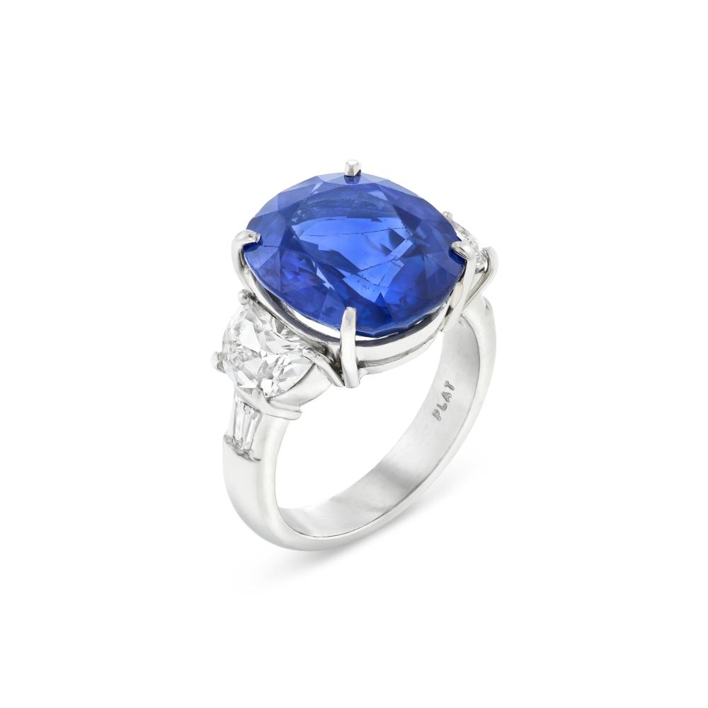SAPPHIRE AND DIAMOND RING

Oval brilliant-cut sapphire of 11.22 carats, half moon-shaped and tapered baguette-cut diamonds, platinum 
GIA, 2021, report no. 6214859217: 11.22 carats, Sri Lanka, heat treatment 
Diamonds: 2 half moon-shaped and two tapered baguette-cut with an approximate total weight of 1.50 - 1.70 carats 
Size/Dimensions: US ring size 7 
Gross Weight: 14.5 grams