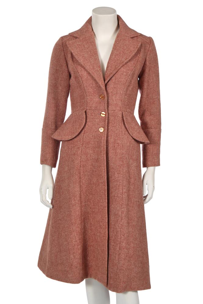 An Ossie Clark pink Harris Tweed wool coat, early 1970s

An Ossie Clark pink Harris Tweed wool coat, early 1970s

labelled, with additional Harris Tweed label, size 10, with curved peplum waist, wide notched lapels, panelled skirt, orange buttons, bust 91cm 36in

Share this lot: