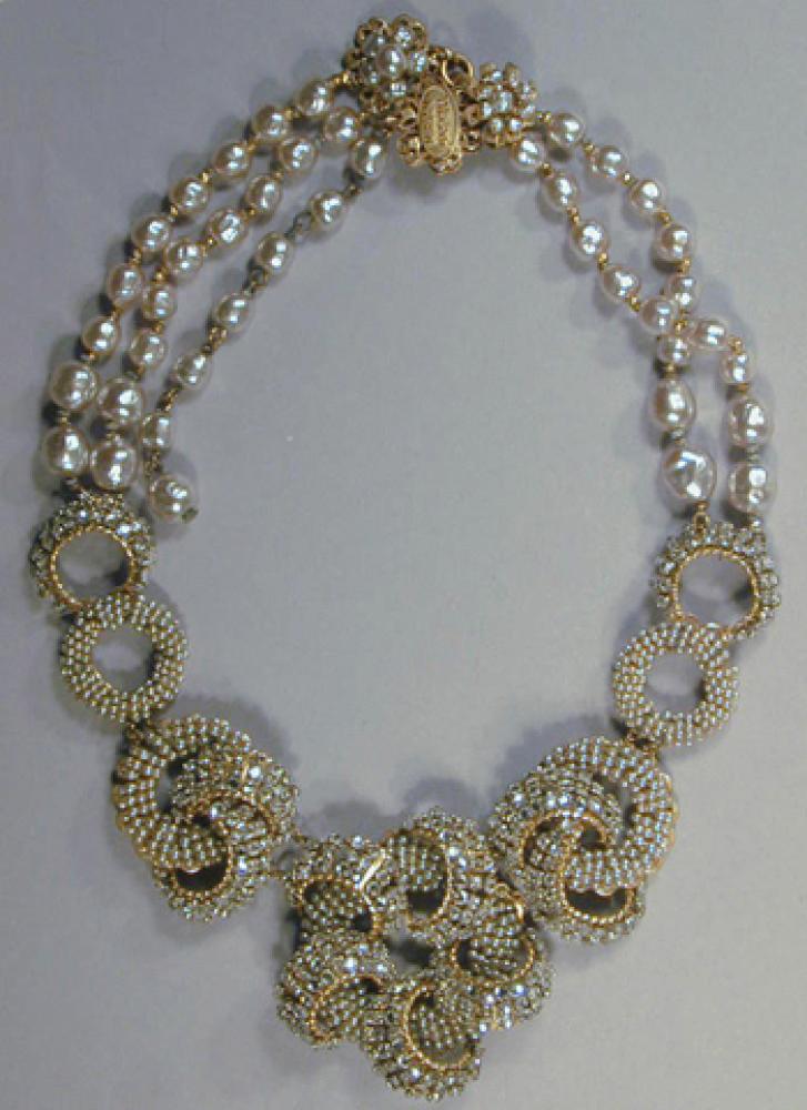 Miriam Haskell Necklace

Lot 221
Miriam Haskell Necklace
 Curved rhinestone and pearl folding into flowers.