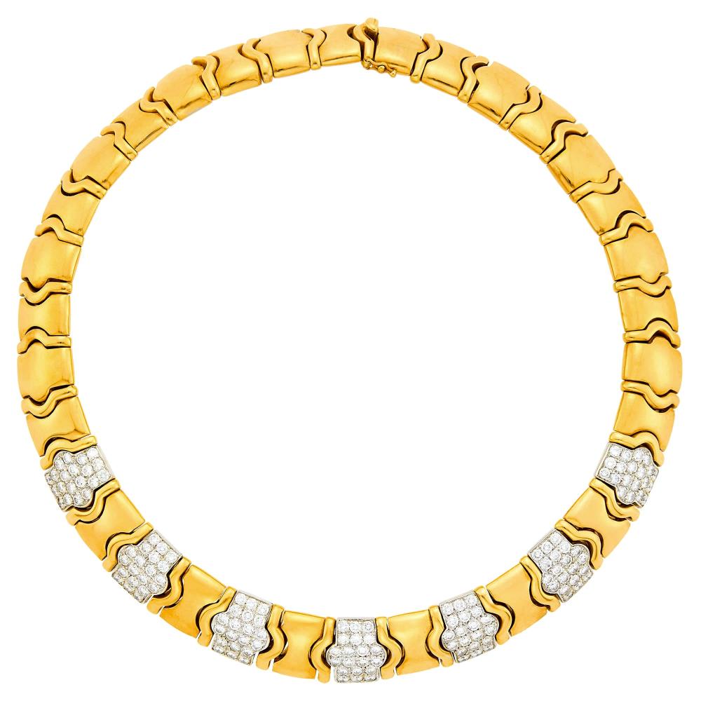 Property of a Distinguished Lady from Athens, GreeceYellow and white gold, 140 round diamonds ap. 11.70 cts., with maker’s mark r.73, ap. 143.2 dwts. Length 15 1/2 inches.

Tests as 18 kt.Diamonds: H-I-VS.Width 5/8 inch.                            
Any condition statement is given as a courtesy to a client, is an opinion and should not be treated as a statement of fact and our Organization shall have no responsibility for any error or omission. Please contact the specialist department to request further information or additional images that may be available.