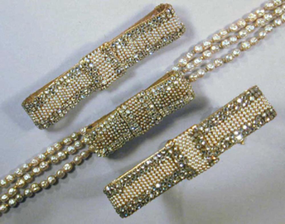 Miriam Haskell Bow Set

Lot 241
Miriam Haskell Bow Set
 Comprising a necklace pin and bracelet, each delicate example encrusted with pearls and rhinestones.