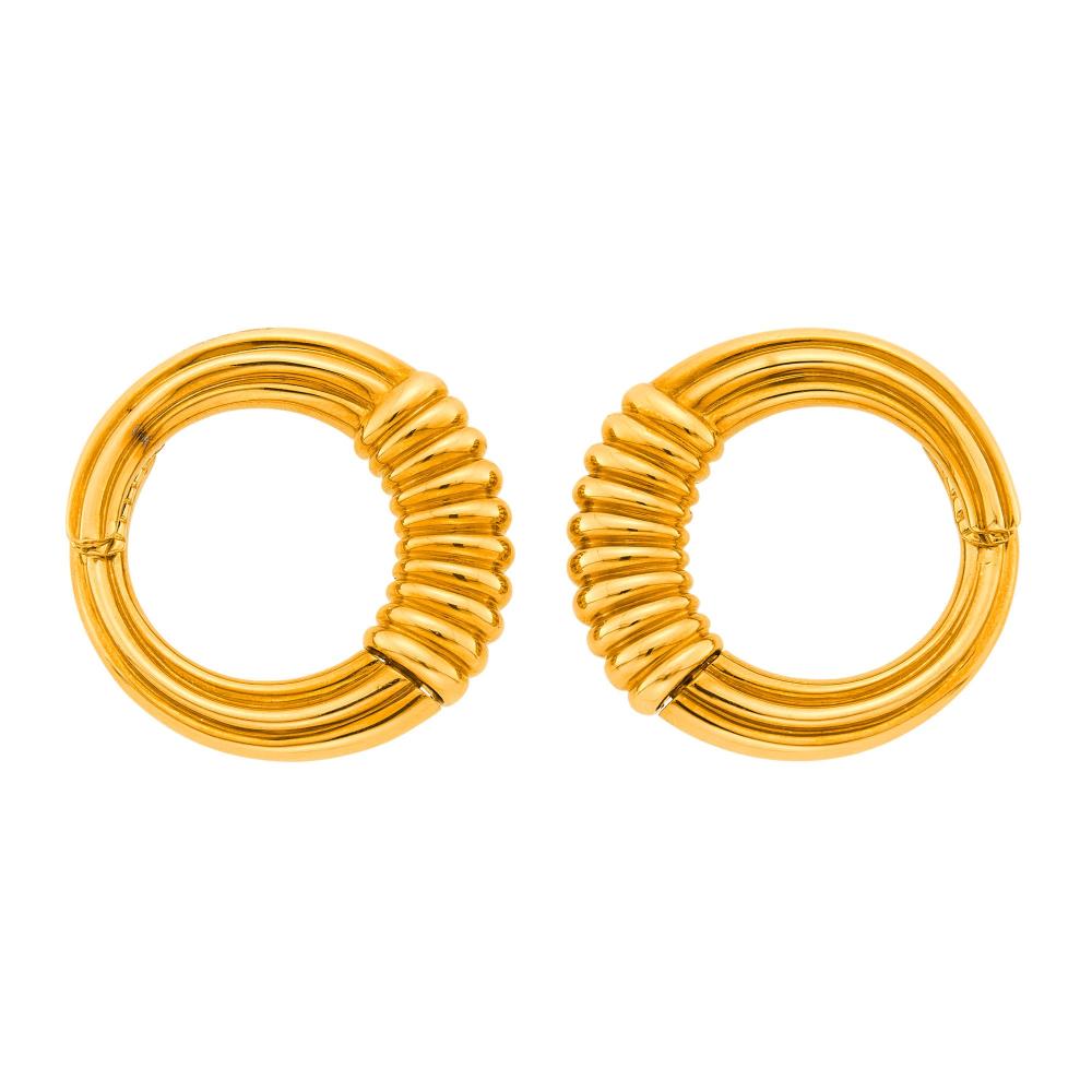 Estate of a Florida LadySigned VCA, no. 3K687.3, ap. 20 dwts.

Test as 18 kt.Hinged back hoops. Diameters 1 1/4 inches. Widths 1/4 to 1/8 inch.                            
Any condition statement is given as a courtesy to a client, is an opinion and should not be treated as a statement of fact and our Organization shall have no responsibility for any error or omission. Please contact the specialist department to request further information or additional images that may be available.