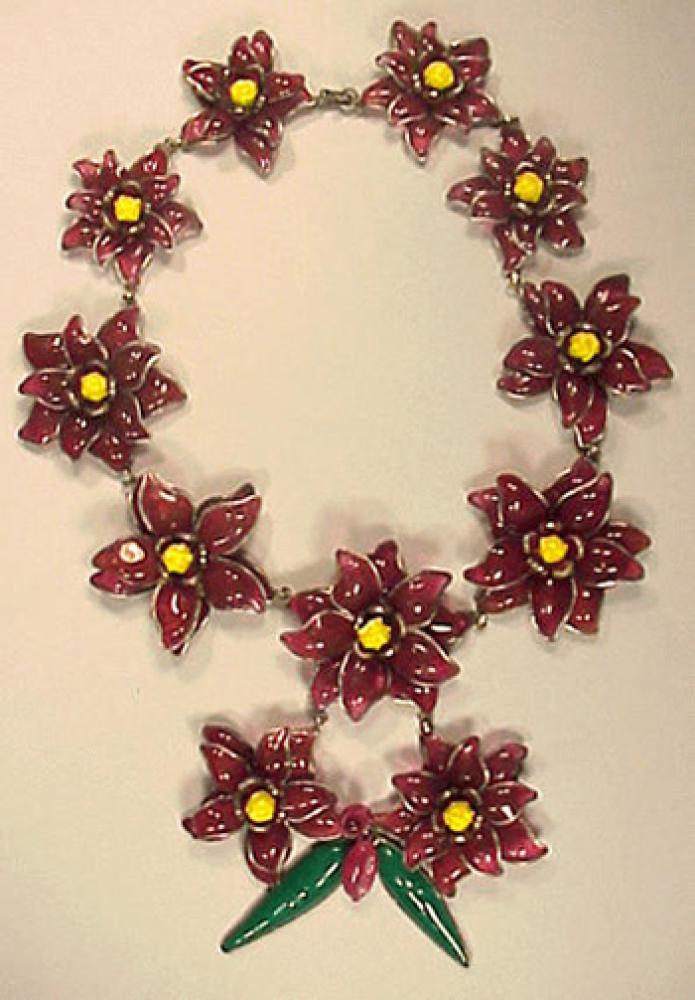 Gripoix for Chanel Glass Flower Necklace Circa 1938

Lot 469
Gripoix for Chanel Glass Flower Necklace Circa 1938
Circa 1938 
 Cinnamon pate de verre flowerhead segments set in silver metal, yellow centers, marked: Made in France.
 See Mauries, Jewelry by Chanel, p.85.