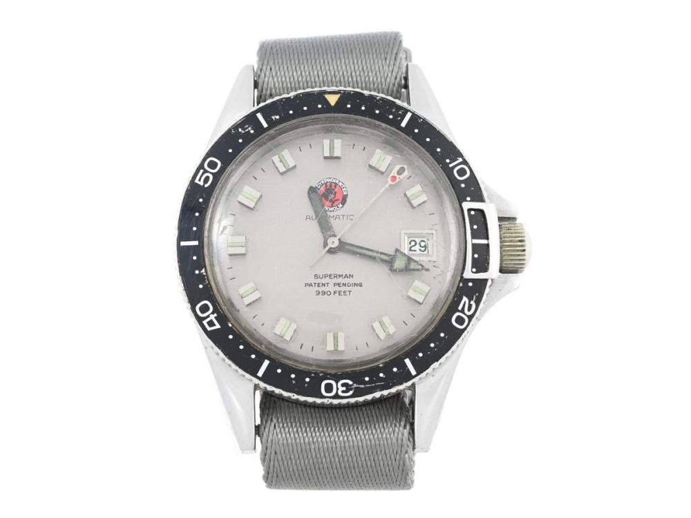 Watches

Yema

YEMA, Superman (Patent Pending, 900 feet), "Dykprodukter Stockholm", Cal ETA 2782, Ref no. 87062, Case no. 146740, men´s wristwatch, 39 mm, steel, self winding, plastic crystal, date, logo on dial, damaged dial/hands, needs overhaul, ATT: 1 movement holder screw missing, case back gasket missing, NATO-strap, approx. 1970.