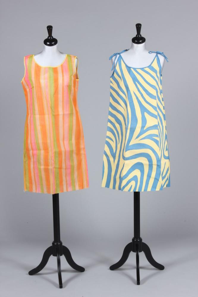 

Three paper dresses in psychedelic swirls and spots, 1960s, including a baby-doll style by Reemay in original packaging and two pairs of patterned stockings, one with Twiggy label (5)
