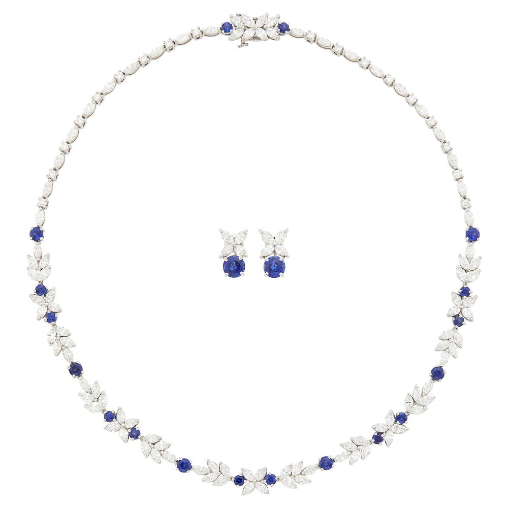 18 round sapphires ap. 3.70 cts., 18 round and 98 marquise-shaped diamonds ap. 13.75 cts., 2 round sapphires ap. 2.25 cts., 8 marquise-shaped diamonds ap. 1.20 cts., necklace signed Tiffany & Co., earclips unsigned, ap. 38.8 dwts. Length 16 inches. With signed necklace folder.

Sapphires: deep blue with royal blue highlights, cleanish, lively.Diamonds: G-H-I-VS.Screw-backs. 9/16 x 5/16 inch.                            
Any condition statement is given as a courtesy to a client, is an opinion and should not be treated as a statement of fact and our Organization shall have no responsibility for any error or omission. Please contact the specialist department to request further information or additional images that may be available.