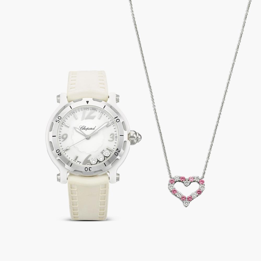 Tiffany & Co. | Chopard

The pendent necklace suspending a heart-shaped motif, set with circular-cut pink sapphires and brilliant-cut diamonds; and a wristwatch with a round ceramic dial containing three free-floating collet-set brilliant-cut diamonds, on a white strap.