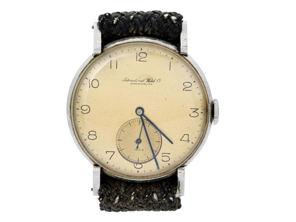 Watches

IWC

INTERNATIONAL WATCH Co, Schaffhausen, men´s wristwatch, 34,5 mm, "Reversed Claw Lugs", Cal 83 (Inca), Serial no. 1092617, Case no. 1102771, steel, manual winding, plastic crystal, small seconds hand, damaged dial, damaged case (pores) Perlon strap, approx. 1945.