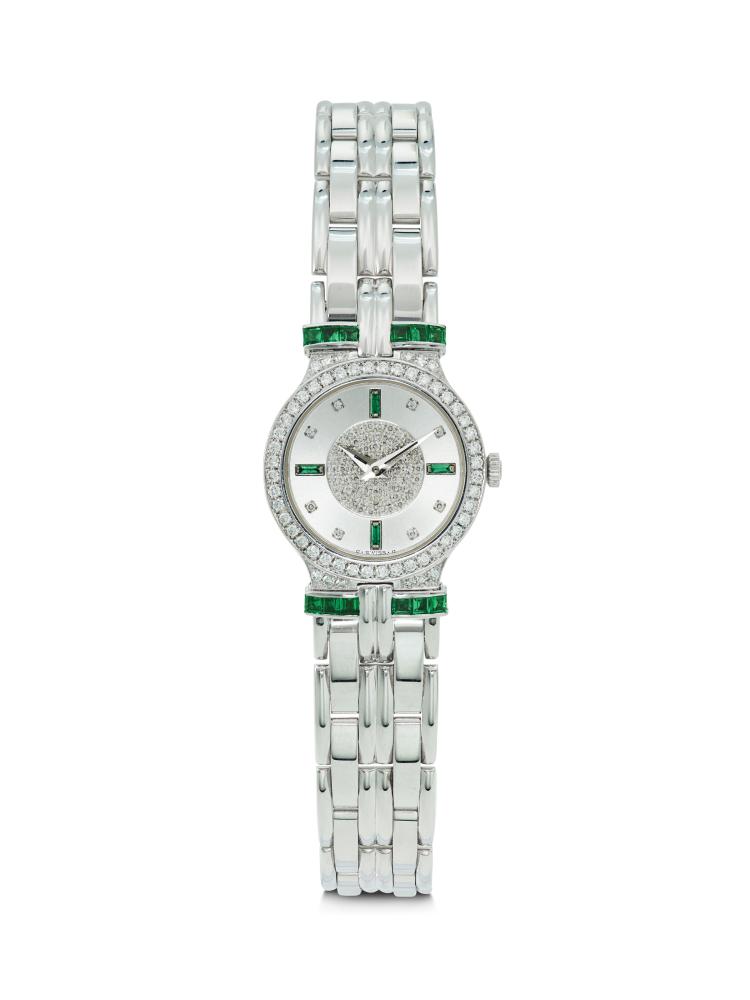 PATEK PHILIPPE, DAZZLING AND HIGHLY RARE 18K WHITE GOLD, DIAMOND, AND BAGUETTE EMERALD-SET QUARTZ WRISTWATCH WITH BRACELET, REF. 4784/12G

CIRCA: 1990s 
MOVEMENT NO: 1’650’185 
CASE NO: 2’871’159 
CASE MATERIAL: 18k white gold 
CASE DIAMETER: 22.5 mm. 
BRACELET MATERIAL: 18k white gold (integrated) 
BRACELET SIZE: Approx. 155 mm. overall length 
DIAL: Silvered, diamond and baguette emerald-set 
MOVEMENT: Quartz 
BOX: No 
PAPERS: No