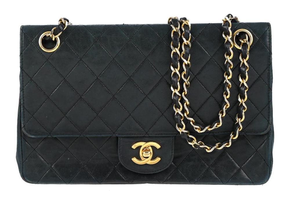 Accessories

Handbags

BAG, CHANEL, Flap Bag Medium, black quilted lambskin, gold-tone hardware, 25x16x6 cm, hologram-marked 0972553, year 1986-1988, dustbag, very signs of wear.