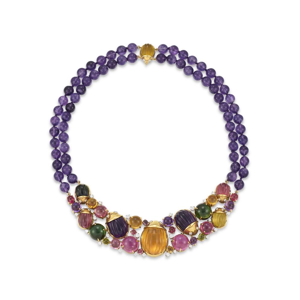 TIFFANY & CO. AMETHYST, CITRINE, TOURMALINE AND DIAMOND NECKLACE

Amethyst beads and carved scarab beetles, circular citrine, pink and green tourmaline cabochons and carved scarab beetles, circular-cut diamonds, 1990s, signed Tiffany & Co.  
Size/Dimensions: inner circumference approximately 42.0 cm 
Gross Weight: 163.6
