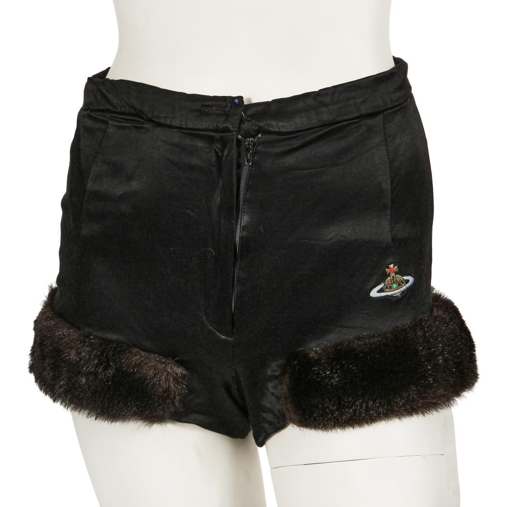 A pair of Vivienne Westwood black satin hot pants, ’Dressing Up’ collection, Autumn-Winter 1991-92

A pair of Vivienne Westwood black satin hot pants, ’Dressing Up’ collection, Autumn-Winter 1991-92

yellow on red woven label, size 12, with faux fur trim, embroidered Orb motif, concealed front pocket, waist 41cm 28in

Share this lot: