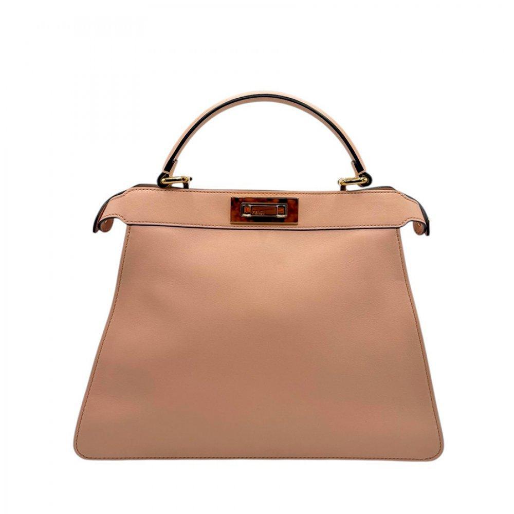Description

FENDI.
Peekaboo IseeU.
In peach leather with structured lines, it is a bag that can be carried both in the hand or on the shoulder thanks to its removable shoulder strap. The peekaboo closure reveals the interior in the same tone.
In perfect condition, unused. Comes with original dust cover, rain case and Entrupy certificate of authenticity.
Measurements: 26 x 33 x 12 cm.