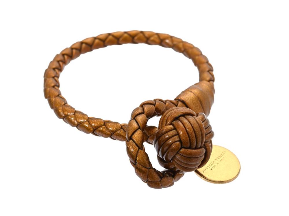 Accessories

Miscellaneous

BRACELET, BOTTEGA VENETA, Intrecciato Bracelet, lacquer dyed brass leather, length 16 cm.