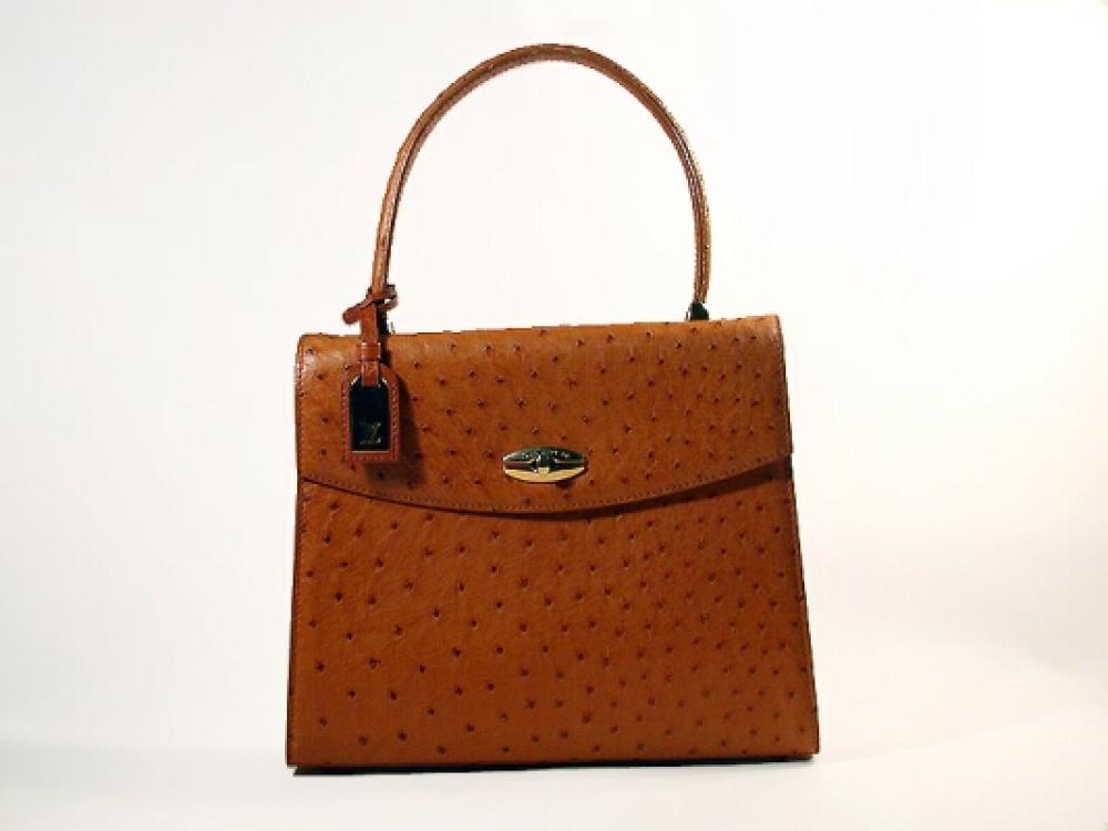 Louis Vuitton Ostrich Handbag

Lot 875
Louis Vuitton Ostrich Handbag
 Of tan ostrich, with gilt-metal closure, LV hang tag and fittings, 10 x 9 inches, labeled: Louis Vuitton. 
Excellent condition.
