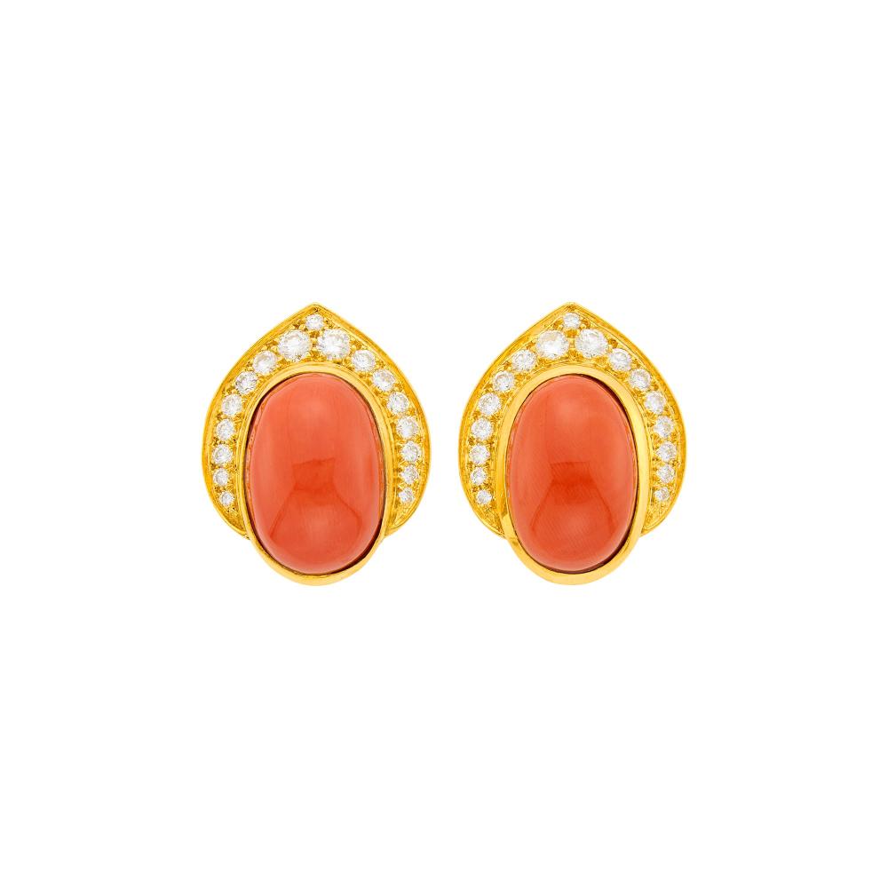 Estate of a Florida Lady18 kt., 2 oval cabochon coral ap. 17.0 x 12.0 x 7.0 mm., 34 round diamonds ap. 1.35 cts., signed Van Cleef & Arpels, NY, no. 50049, with maker’s marks and French export marks, ap. 13.2 dwts. gross.

Corals: medium deep slightly pinkish orange, even color, very good luster.Diamonds: F-G-VSClip backs. 1 x 3/4 inch.                            
Any condition statement is given as a courtesy to a client, is an opinion and should not be treated as a statement of fact and our Organization shall have no responsibility for any error or omission. Please contact the specialist department to request further information or additional images that may be available.