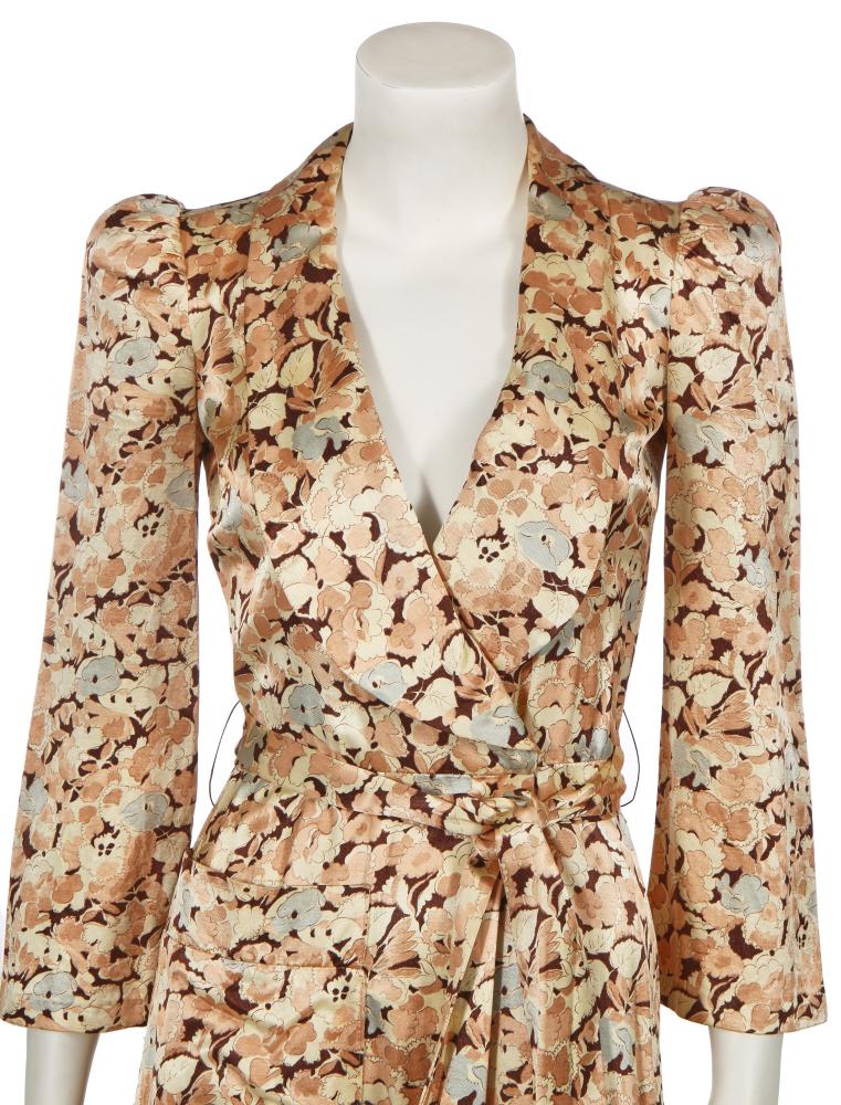A Biba floral printed satinised jersey coat dress, circa 1974

A Biba floral printed satinised jersey coat dress, circa 1974

printed black on gold Art Nouveau label, printed with floral designs in Autumnal tones, with deep shawl collar, self-ties and hook and loop closure to waist, padded shoulders bust 81cm 32in

The Pari Collection

Share this lot: